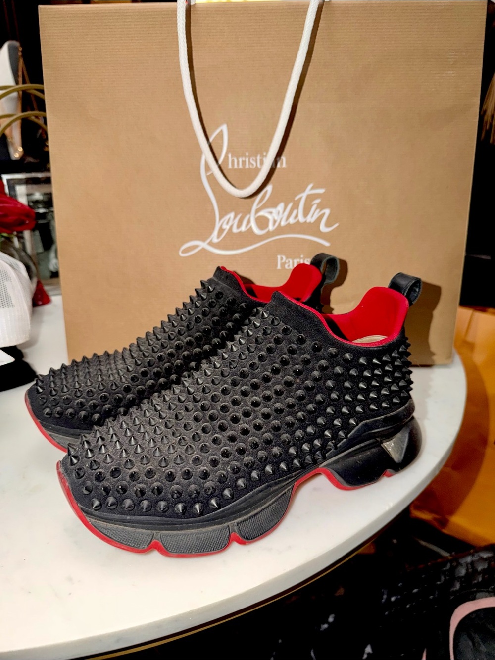Christian Louboutin Black Studded Slip-On Sneakers with Red Accents